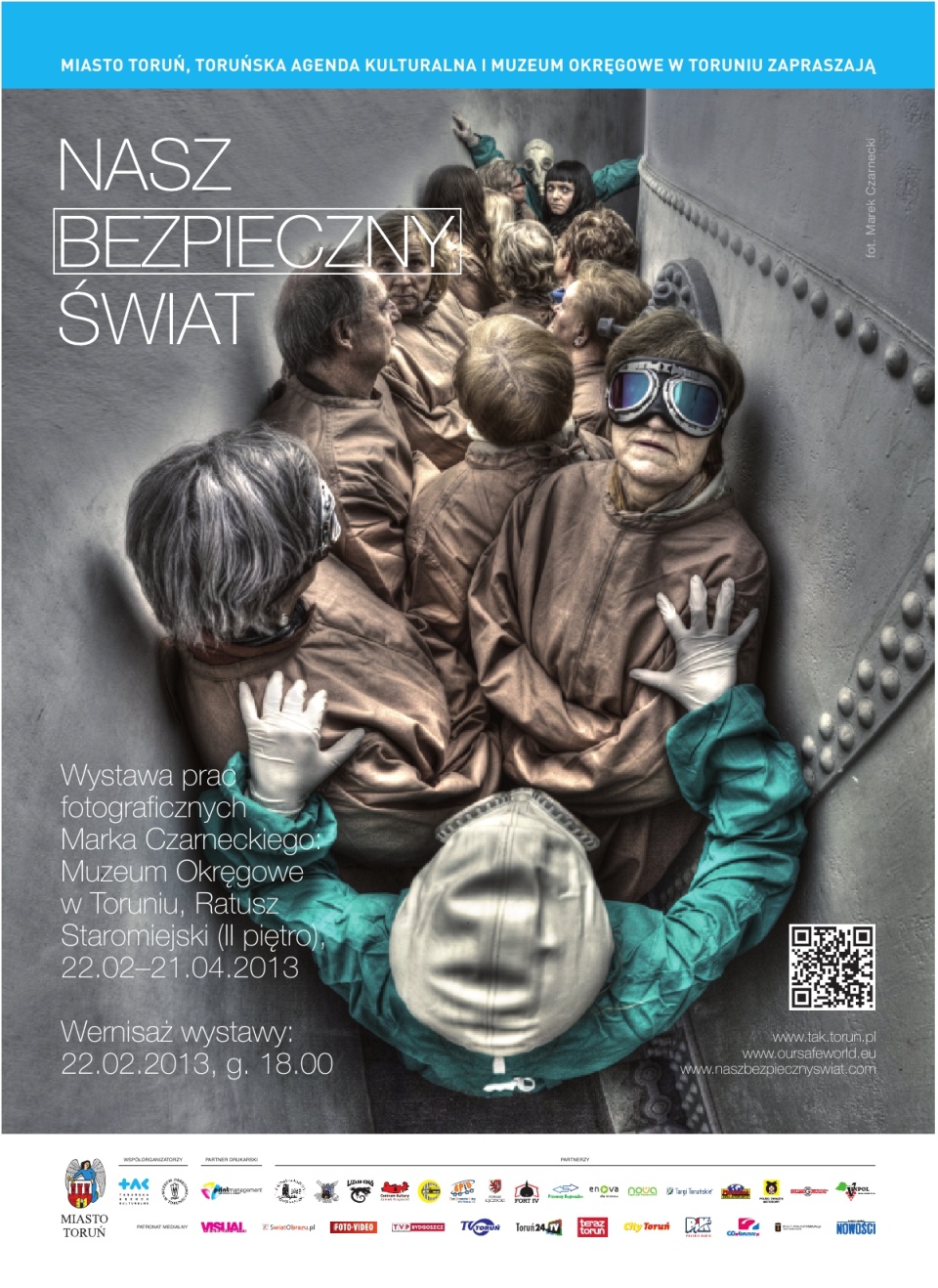 Plakat wystawy "Nasz bezpieczny świat" Marka Czarneckiego w Muzeum Okręgowym w Toruniu. Ekspozycja czynna do 21.04.2013.