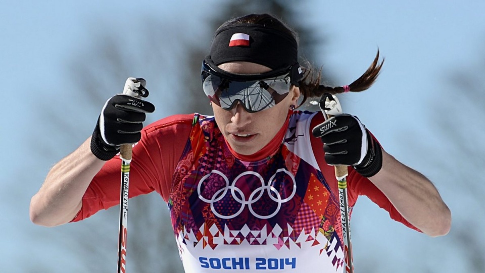 Pokonując rywalki i ból, Justyna Kowalczyk przebiegła 10 km zdobywając złoto. Fot. PAP/EPA