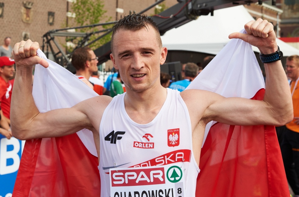 Polak Marcin Chabowski na mecie półmaratonu, w trakcie ostatniego dnia lekkoatletycznych Mistrzostw Europy w Amsterdamie. Fot. PAP/Adam Warżawa