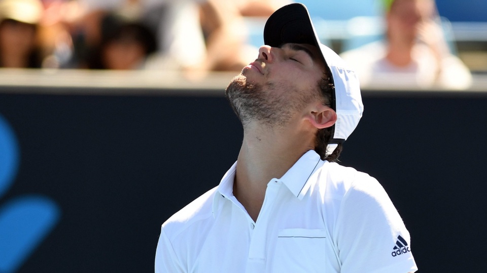 Jerzy Janowicz prowadził już 2:0 w meczu z Marinem Cilicem, ale ostatecznie zszedł z kortu jako przegrany. Fot. PAP/EPA/JULIAN SMITH