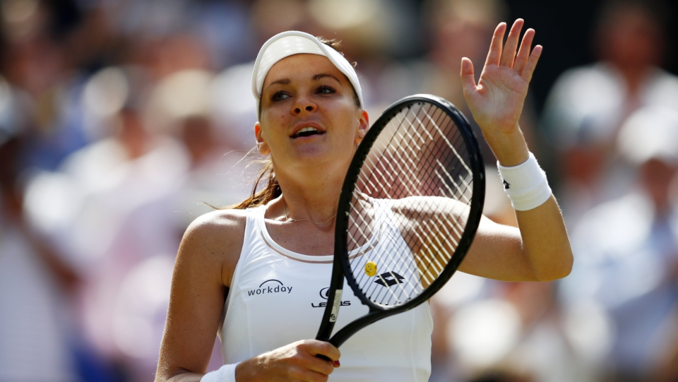 Na zdjęciu Agnieszka Radwańska, która cieszy się z awansu do 4 rundy tegorocznego Wimbledonu. Fot. PAP/EPA/NIC BOTHMA