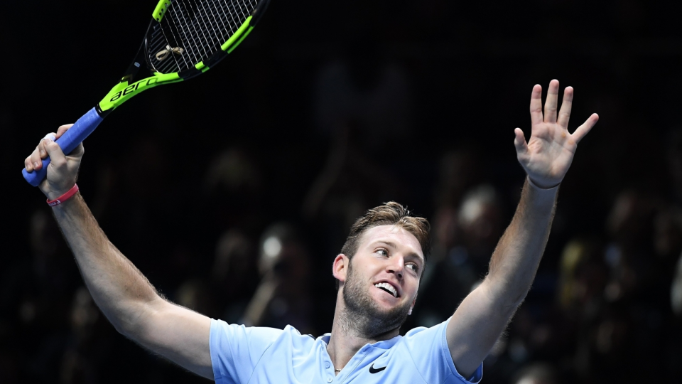 Na zdjęciu amerykański tenisista Jack Sock, który cieszy się z awansu do półfinału singla ATP Finals 2017. Fot. PAP/EPA/ANDY RAIN