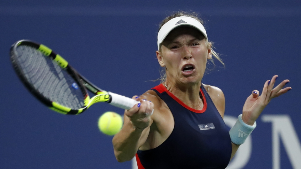 Na zdjęciu Caroline Wozniacki podczas meczu w 2. rundzie US Open 2018. Fot. PAP/EPA/JASON SZENES