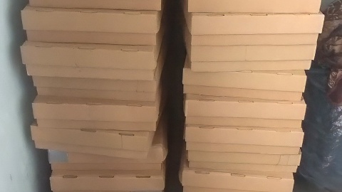 Zatrzymani mężczyźni zajmowali się pakowaniem oraz dystrybucją nielegalnego towaru. / Fot. CBŚP