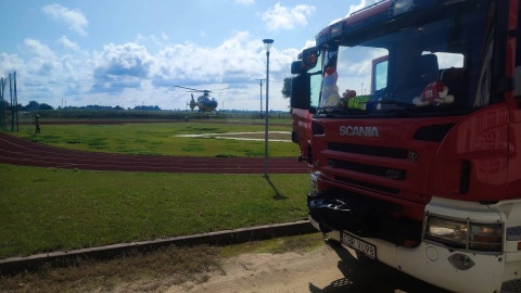 Interwencja służb - dziecko wypadło przez okno/fot. OSP Szczuka